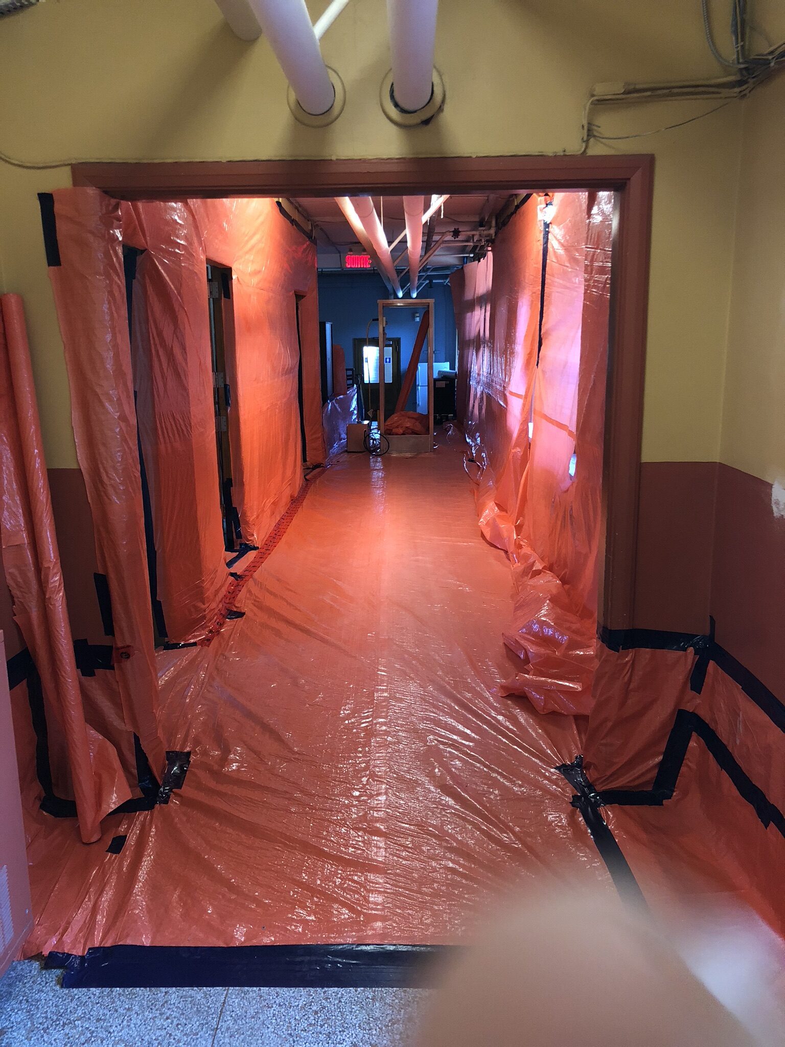 Before: building area with suspicious materials and potential contamination